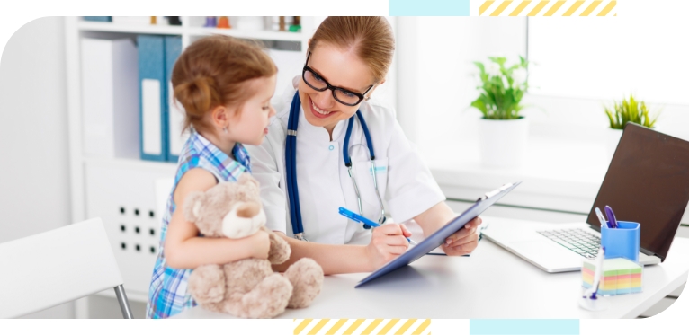 An interaction between a doctor and a small girl holds a stuffed animal