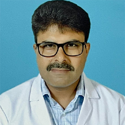 A headshot of Dr . Mahesh Satija Professor, Department of Community Medicine, Dayanand Medical College & Hospital, Ludhiana.