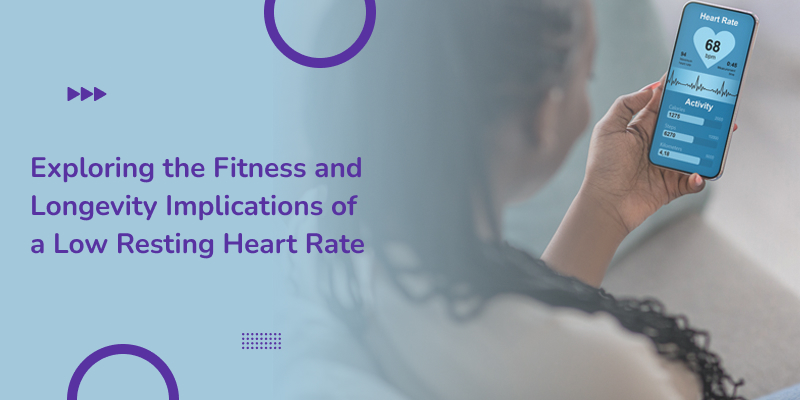 A young black lady checking her heart rate on mobile phone illustrates the relation between low resting heart rate and longevity.